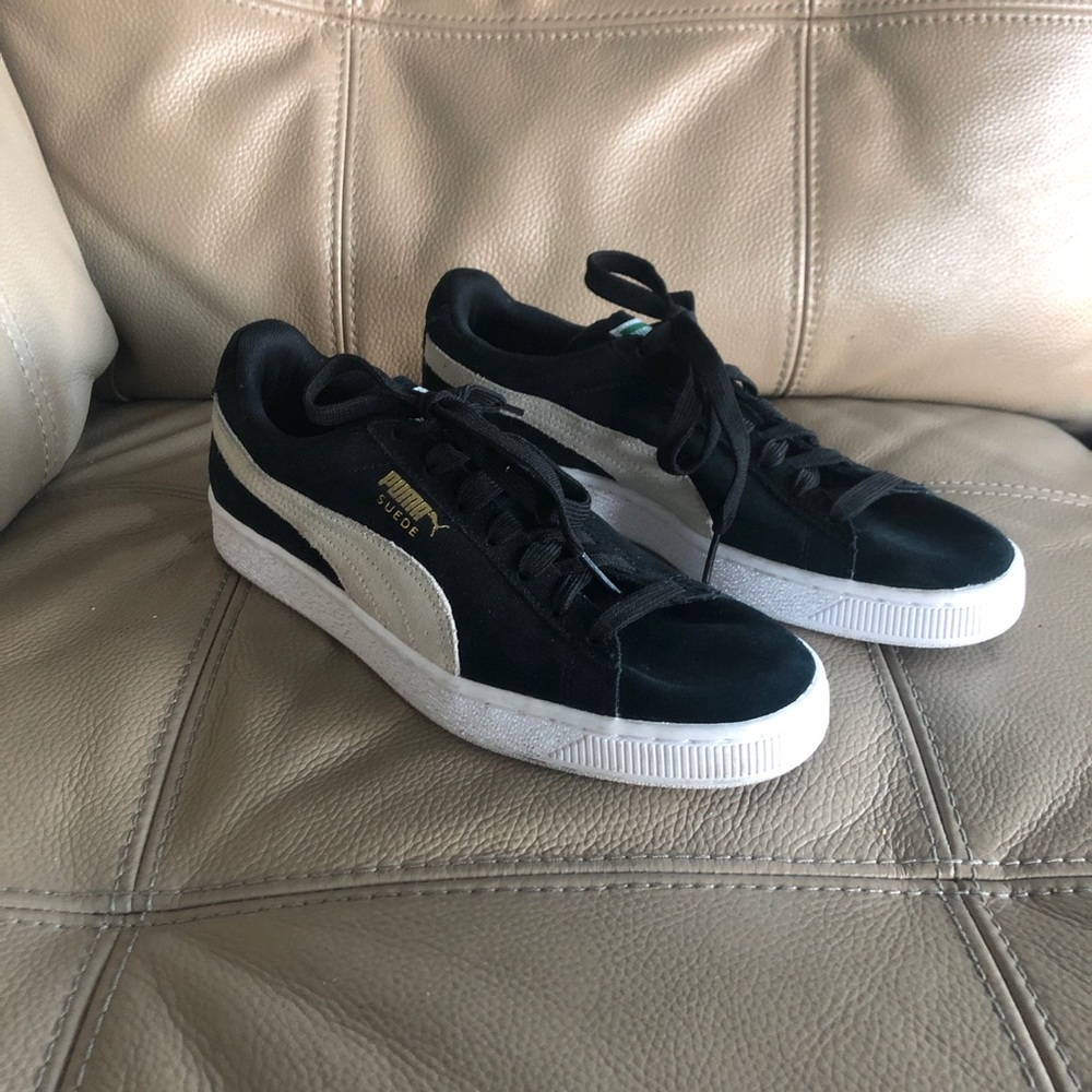 Puma black suedes
